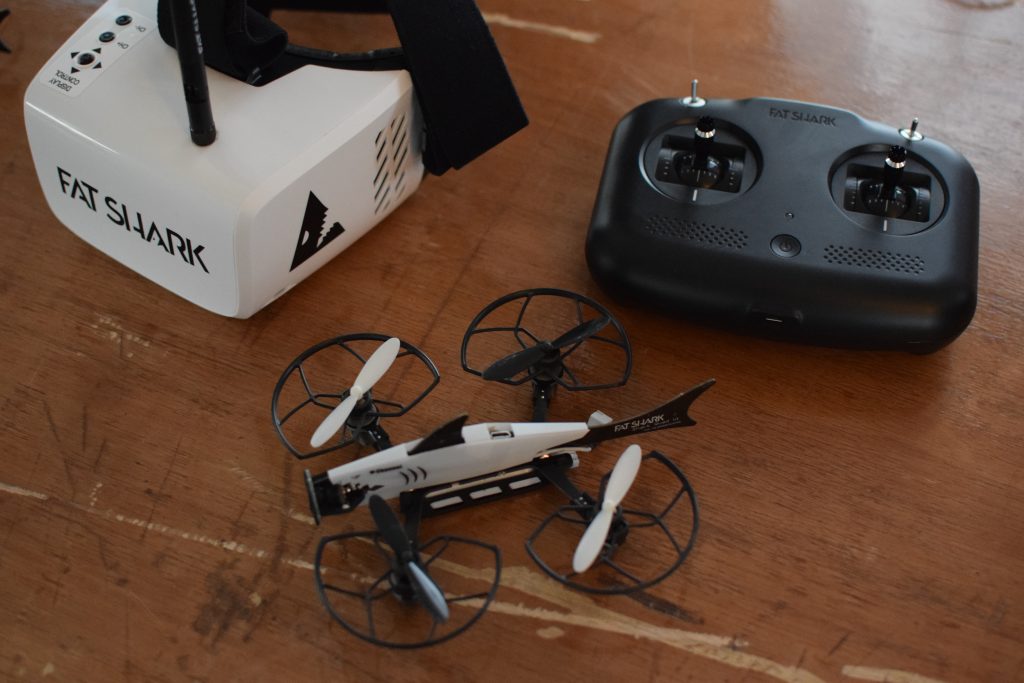 Drone, CES, Drone Rodeo. The Fat Shark drone sitting with its controller and FPV goggles.