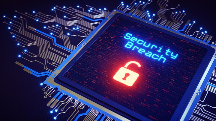 Close up on an artificial CPU with circuitry and a "Security Breach" message and an open padlock displayed on top of it.