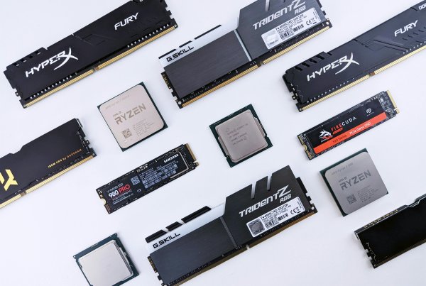 Various sizes of SSD cards are laid out on the desk.