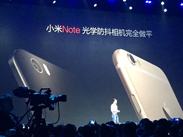 Lei Jun mocking the iPhone 6 Plus camera bump.